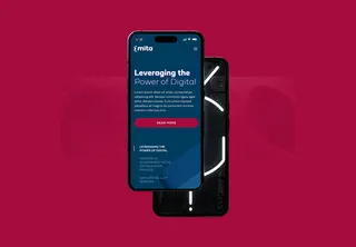 MITA site on a phone against a deep red background: 'Leveraging the power of digital'