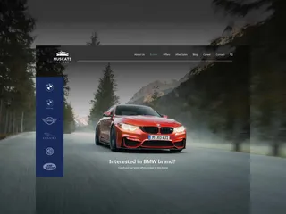 Muscats Motors website with a red BMW on a misty forest road